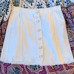 Distressed white denim high waisted skirt